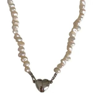 Elegant freshwater pearl necklace featuring a polished silver heart-shaped magnetic clasp