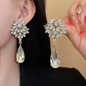 Elegant silver needle flower teardrop earrings with sparkling crystals for women