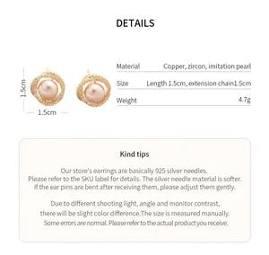 Close-up detail of gold plated pearl earrings with zircon inlay and size specs