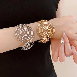 Minimalist gold and silver spiral metal cuff bracelets for women, stylish open design