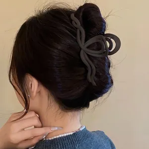 Matte black wavy hair claw clip for women, stylish acrylic shark clip hair accessory