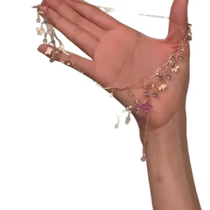 Double-layered gold-tone necklace featuring purple resin butterflies and rhinestones