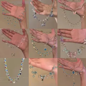 Collection of vibrant summer dopamine necklaces with butterfly charms and zircon accents