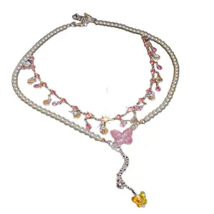 Elegant double-layered pearl and zircon necklace featuring pink butterfly and shell charms