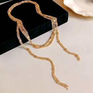 Elegant multilayer gold chain long necklace for minimalist and sophisticated sweater styling