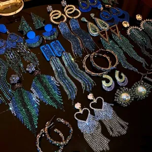 Collection of luxury colorful rhinestone tassel earrings in various elegant designs