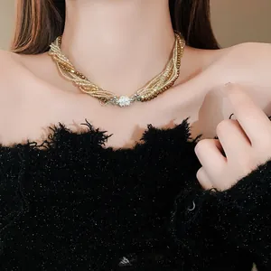Elegant multi-strand crystal beaded choker necklace featuring a sparkling rhinestone clasp