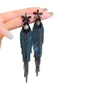 Elegant silver needle tassel earrings with colorful sparkling zircon long drop design.