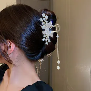 Elegant rhinestone butterfly and lily of the valley pearl tassel hair claw clip for women