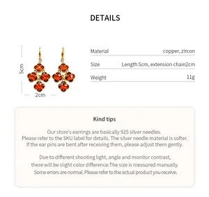 Macro detail view of vintage 18k gold plated clover earrings with sparkling zircon stones