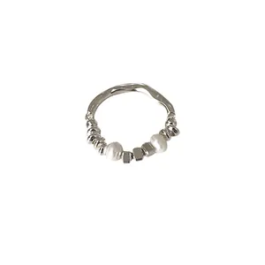 Minimalist irregular freshwater pearl elastic ring with silver geometric beads