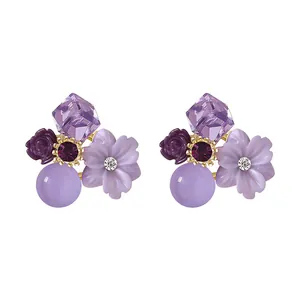 Elegant purple floral crystal stud earrings with rhinestone accents for women's fashion