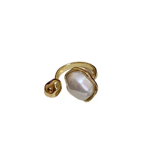 Elegant vintage gold plated baroque pearl open ring featuring an irregular oval design