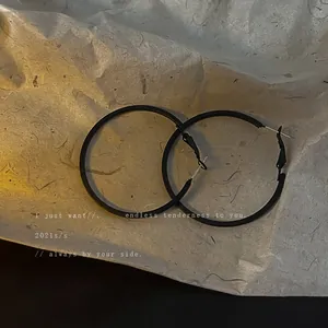 Large minimalist matte black geometric metal hoop earrings for women
