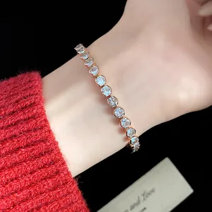 Detailed macro shot of an elegant rose gold tennis bracelet featuring sparkling round zircons