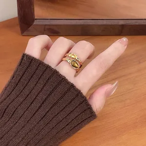 Vintage style gold-plated double-layer ring featuring tiger eye stone and cubic zirconia