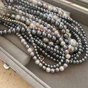 Elegant vintage French style grey and white pearl necklace set in a grey jewelry box