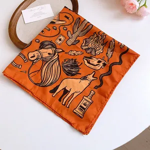 Detailed view of an orange western-themed bandana featuring various cowboy illustrations