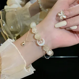 Bracciale di Perline in Pietra Occhio di Gatto Stile Ins Con Ciondolo a Luna e Campanello Gioielli Moda Fatti a Mano da Donna