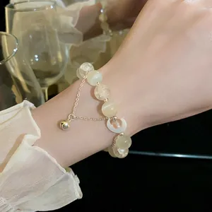 Elegante bracciale di perline in pietra occhio di gatto con campanello e ciondolo a luna