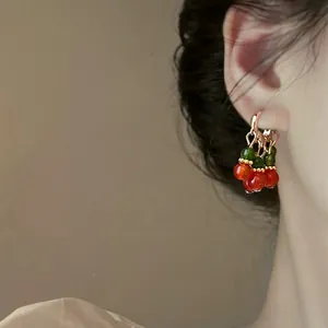 Elegant Neo-Chinese style beaded earrings with red and green berry-like charms