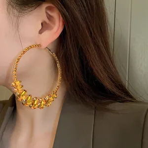 Oversized amber crystal hoop earrings with retro teardrop design for a stylish look