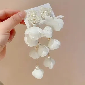 Elegant forest-style white floral drop earrings with heart-shaped pearl studs