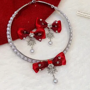 Sweet red bow necklace and earrings set with crystal snowflakes and pearl drops