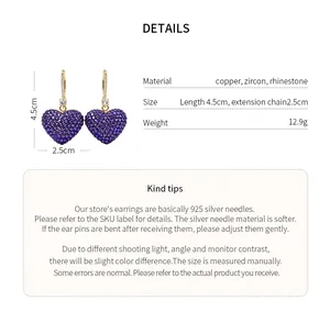 Detail view of purple zircon heart earrings with size and material specifications.