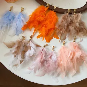 Bohemian feather tassel earrings set in various colors with elegant designs