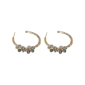 Exquisite gold-plated hoop earrings featuring sparkling crystal flowers and inlaid zircons