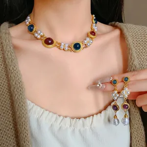 Vintage court style necklace and earrings set with artificial pearls and colorful gems