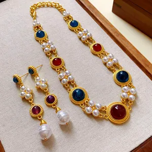 Vintage royal style necklace and earring set with pearls and red blue stones