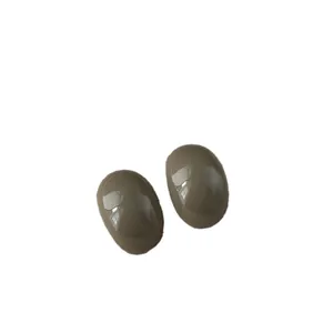 Elegant oval resin stud earrings in taupe grey for a minimalist retro aesthetic.