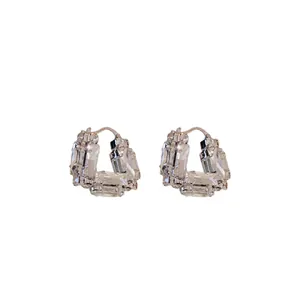 Elegant U-shaped silver hoop earrings featuring sparkling emerald cut crystals for women