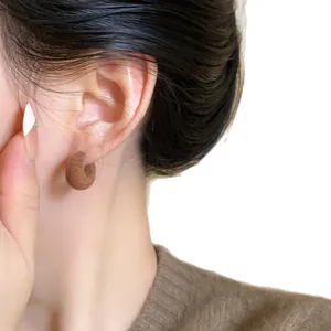 Elegant brown flocked C-shaped stud earrings for women in autumn winter fashion style