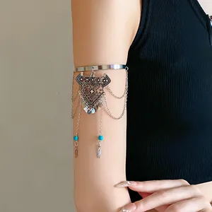 Bohemian vintage silver arm cuff bracelet with tassel and turquoise beads detail