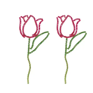 Statement hollow rose flower tassel earrings with vibrant pink and green rhinestones