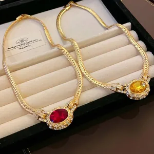 Vintage royal style snake bone chain necklace with red and yellow crystal pendants