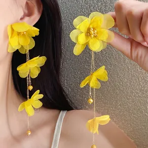 Elegant yellow chiffon flower tassel earrings with golden chain detailing for women