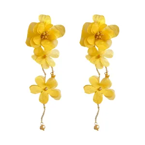 Exquisite yellow chiffon flower tassel earrings featuring glass beads and golden chains