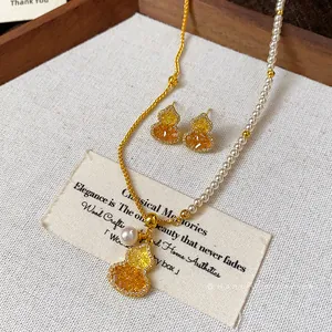 Elegant gold plated gourd necklace and earrings set with zircons and pearls for women