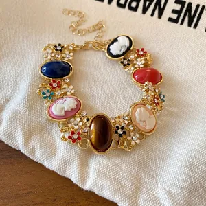 Elegant French vintage cameo bracelet with colorful resin portraits and floral crystals
