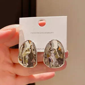 Elegant irregular metallic silver stud earrings featuring S925 silver needles for fashion women