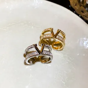 Gold and silver plated double-layer V-logo open rings with sparkling zircon stones