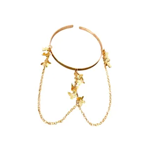 Bracelet de bras élégant en métal doré avec pampilles papillon pour accessoire mode