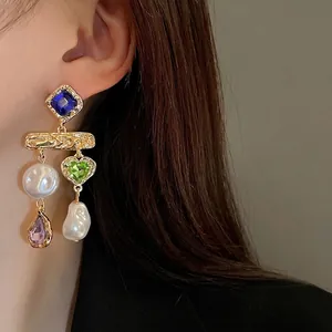 Vintage gold earrings featuring colorful crystals and white baroque pearls for women