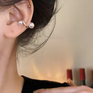 Elegant pearl and zircon ear cuff worn on ear, no piercing required vintage style