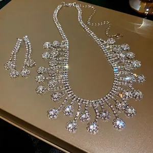 Exquisite silver rhinestone fringe jewelry set including tassel necklace and drop earrings