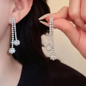 Elegant silver tassel earrings with sparkling rhinestones for bridal or evening wear